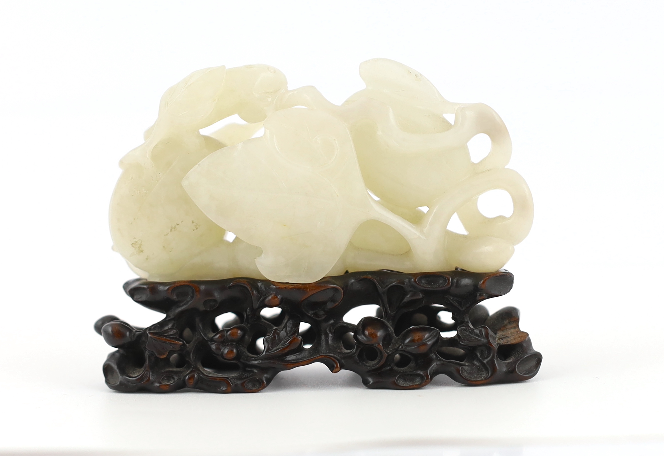 A Chinese white jade carving of a cluster of melons, 18th century